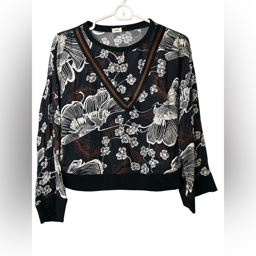 Warm Black and White V-Neck Sweater with Floral Design